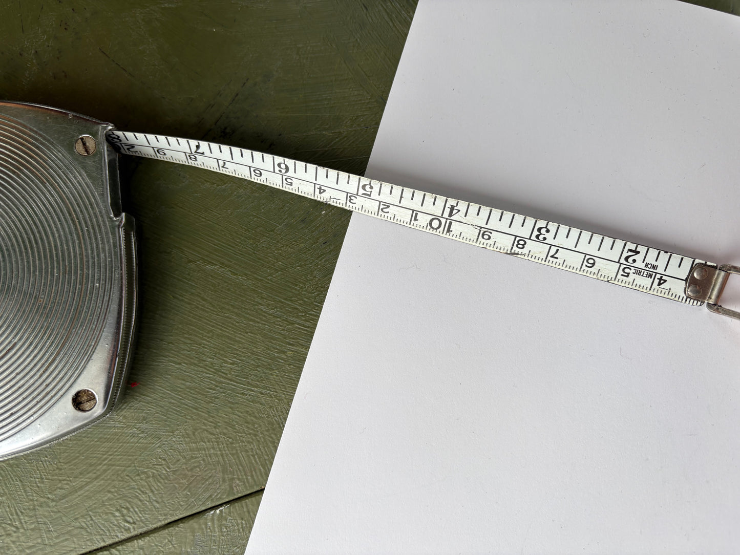 VINTAGE REEL TAPE MEASURE