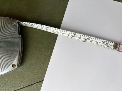 VINTAGE REEL TAPE MEASURE