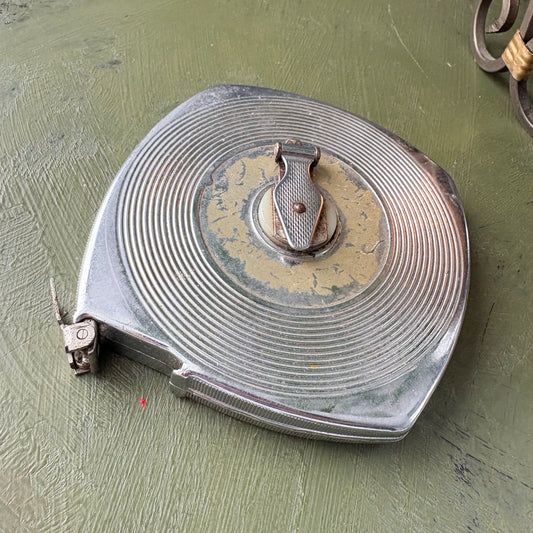 VINTAGE REEL TAPE MEASURE